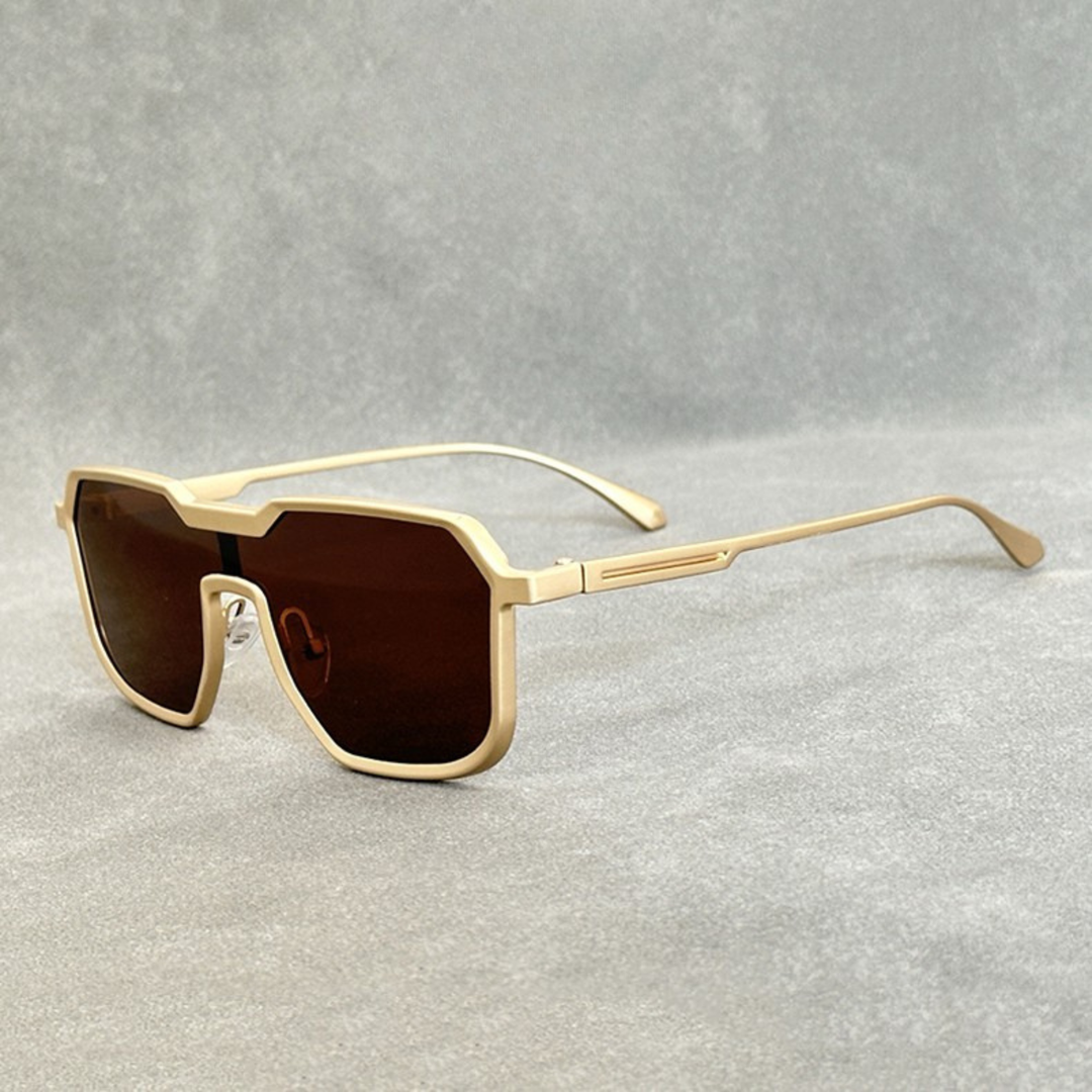 Gold titanium sunglasses with Brown gradient lenses from the Dylan Archer Shades collection, defined by an elegant chic style and a clean, modern silhouette.