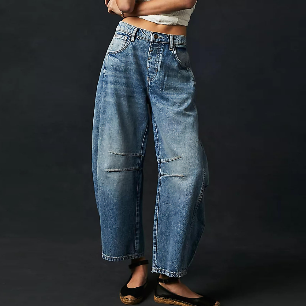 Blue wide leg jeans from the Dylan Archer women’s premium clothing collection, defined by an elegant chic style and a clean, relaxed silhouette.