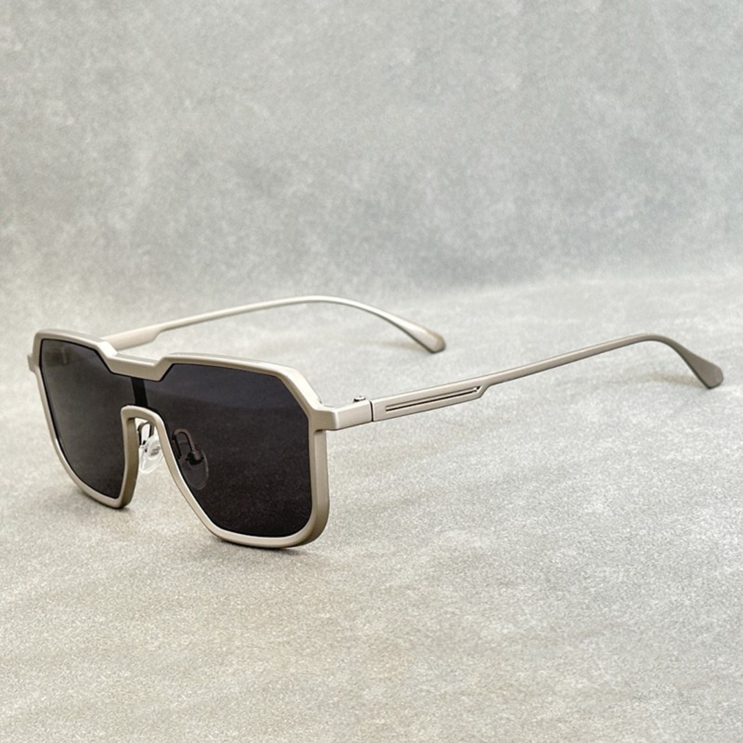 Silver titanium sunglasses with Black gradient lenses from the Dylan Archer Shades collection, defined by an elegant chic style and a clean, modern silhouette.
