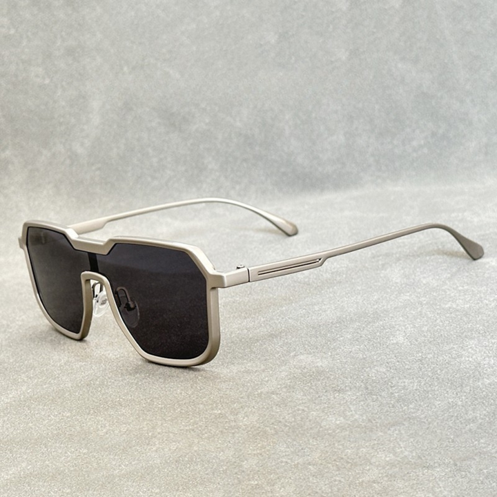 Silver titanium sunglasses with Black gradient lenses from the Dylan Archer Shades collection, defined by an elegant chic style and a clean, modern silhouette.