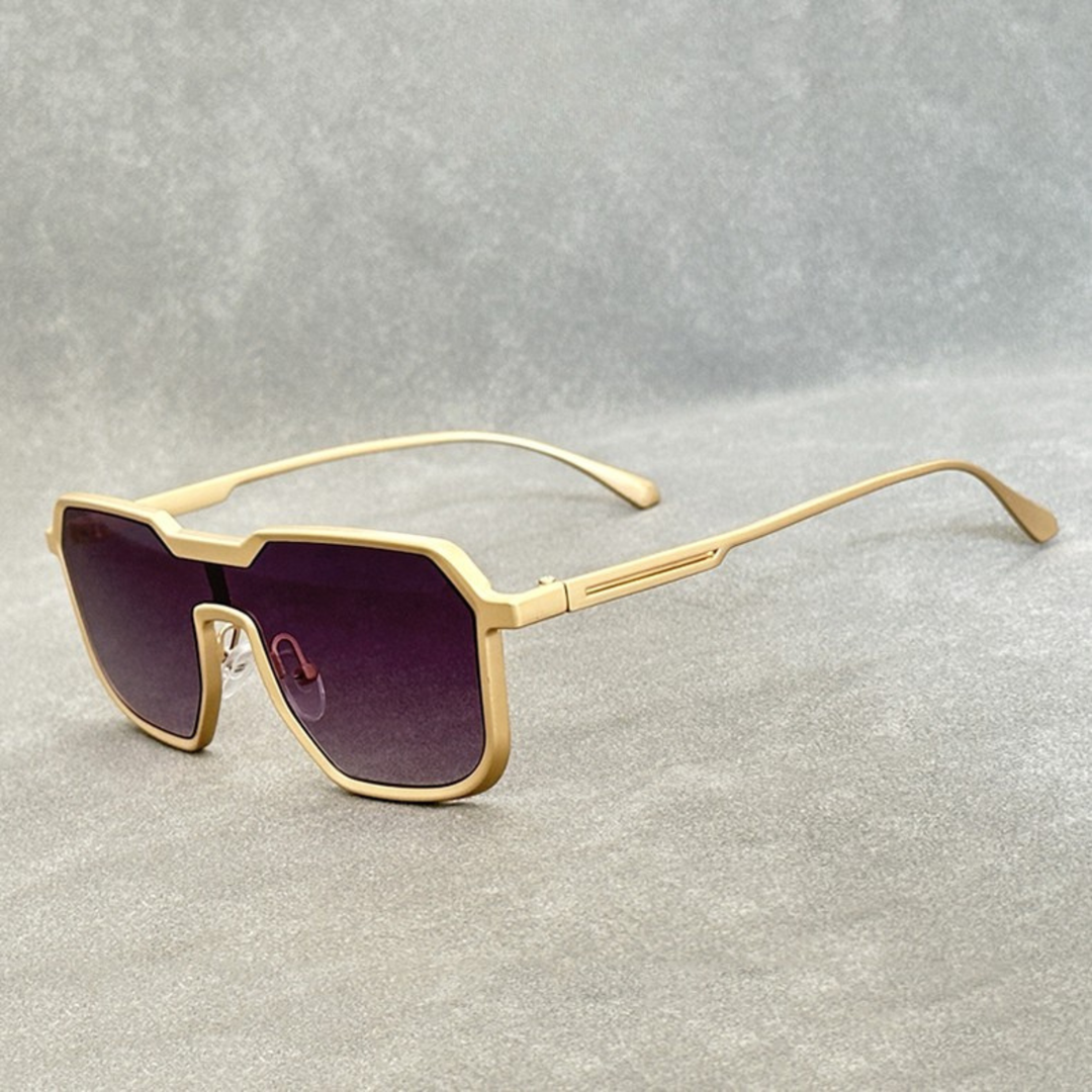 Gold titanium sunglasses with purple gradient lenses from the Dylan Archer Shades collection, defined by an elegant chic style and a clean, modern silhouette.