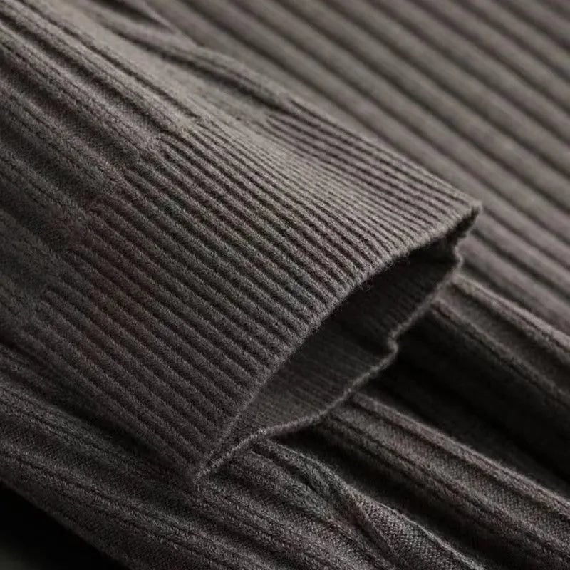 Grey quarter zip knit sweater with a structured vertical rib design from the Dylan Archer men’s premium clothing collection, defined by an elegant chic style and a clean, refined silhouette.